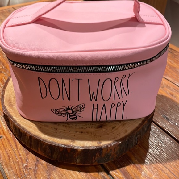 Rae Dunn Handbags - Rae Dunn, NWT, Don’t Worry Be Happy Cosmetic Bag, pink/black